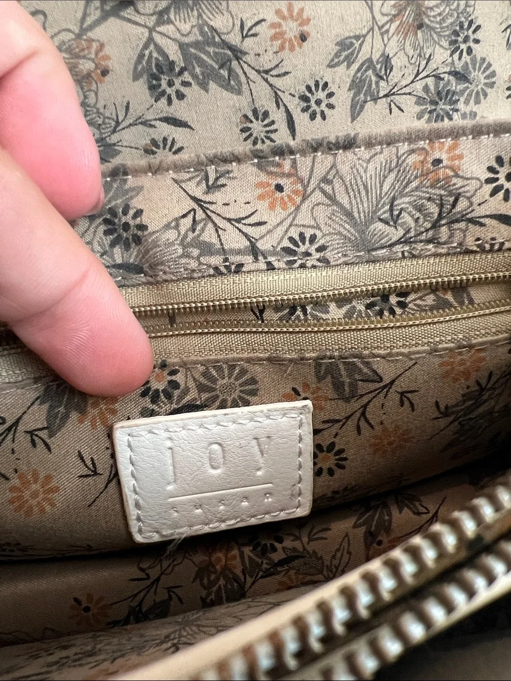 Joy Susan White Crossbody Bag with Gold Ring Accent
